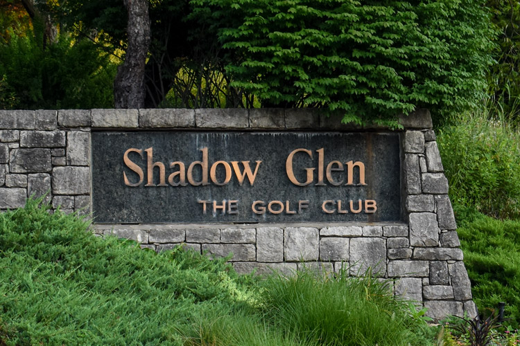 Rock sign at the entrance of Shadow Glen Golf Club