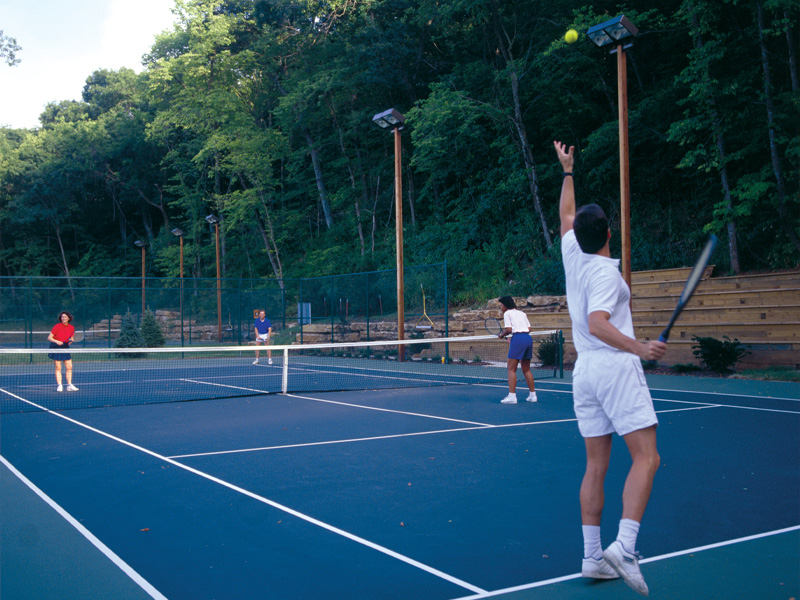 Historical Photo of People Playing Tennis at Cedar Creek (Circa 1989)