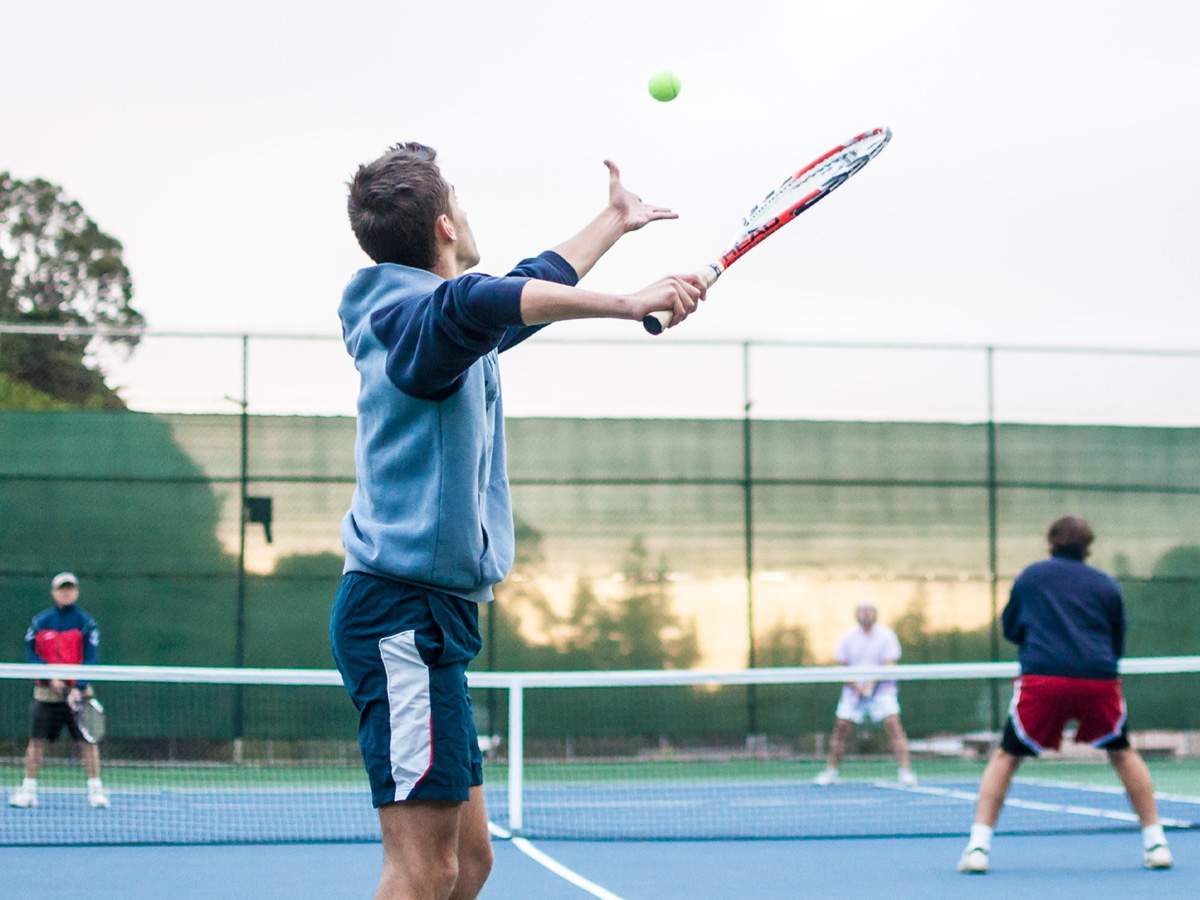 Men playing tennis